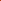 A close-up of bright burnt orange yarn texture filling the frame.